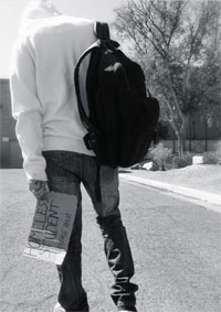 Student walking with backpack