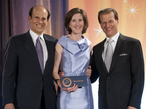May 15, 2010 Kim Jakovics, a teacher at Annapolis High School, receives $25,000 from Milken Family Foundation Co-Founder Michael Milken (left) and Foundation Chairman Lowell Milken (right) at the 2010 Milken Family Foundation National Educator Forum in Los Angeles, CA on May 15, 2010.
