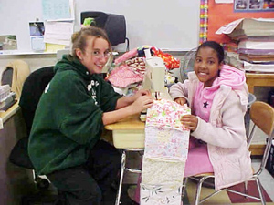 Students sew quilts for Project Linus to be given to children in the hospital.