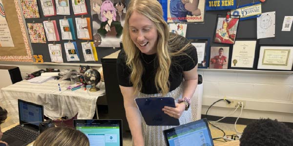 Teacher of the year, Kat Locke-Jones with a student one-on-one