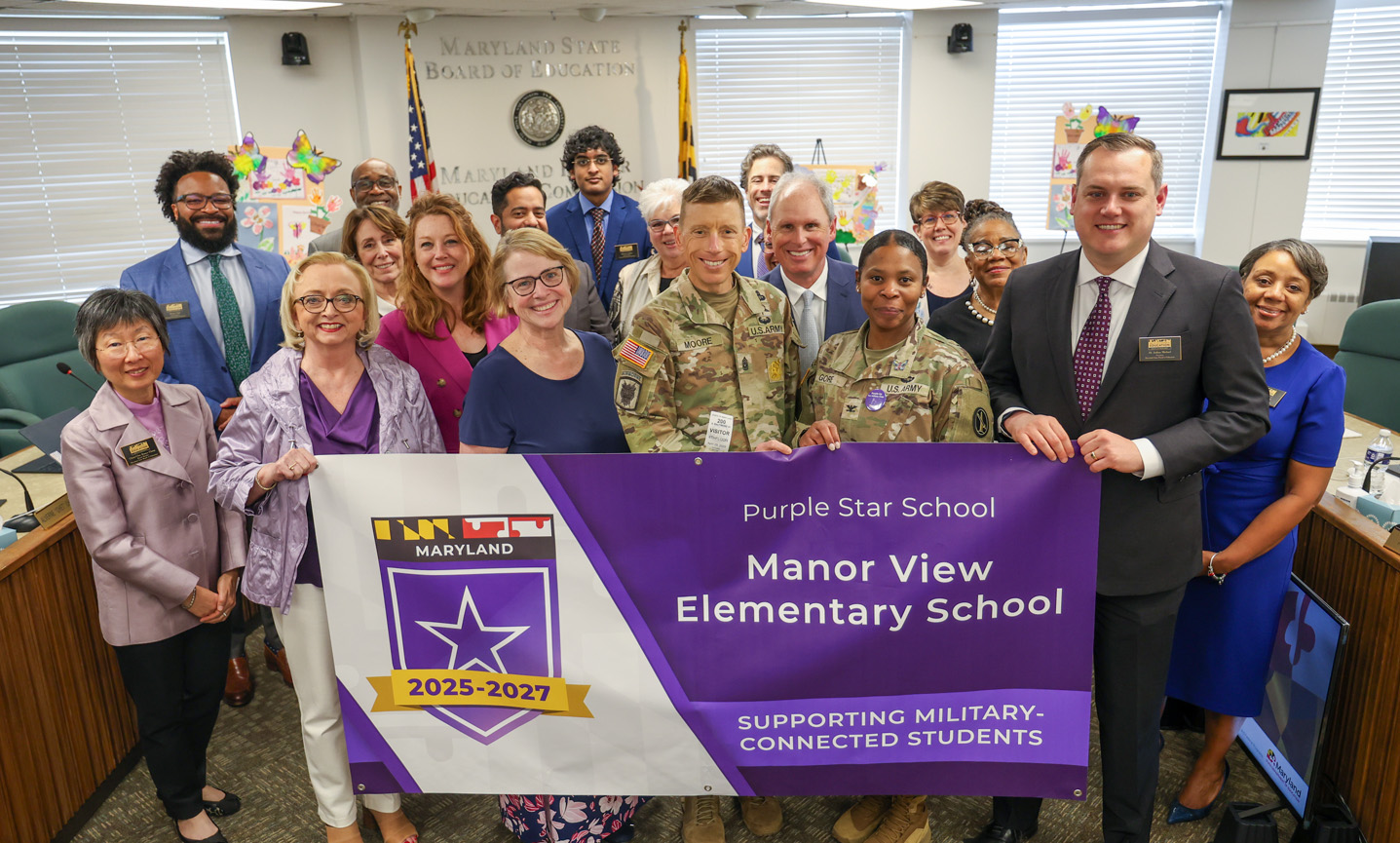 Military and School Leaders in Board Room
